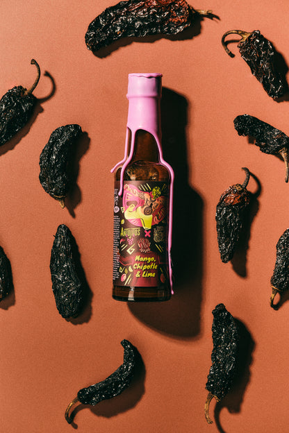 Mango, Chipotle and Lime Hott Sauce Photographed next to main Ingredient Chipotle - Heriot Hott