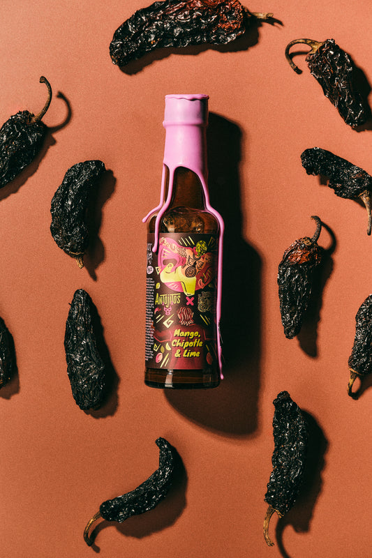 Mango, Chipotle and Lime Hott Sauce Photographed next to main Ingredient Chipotle - Heriot Hott