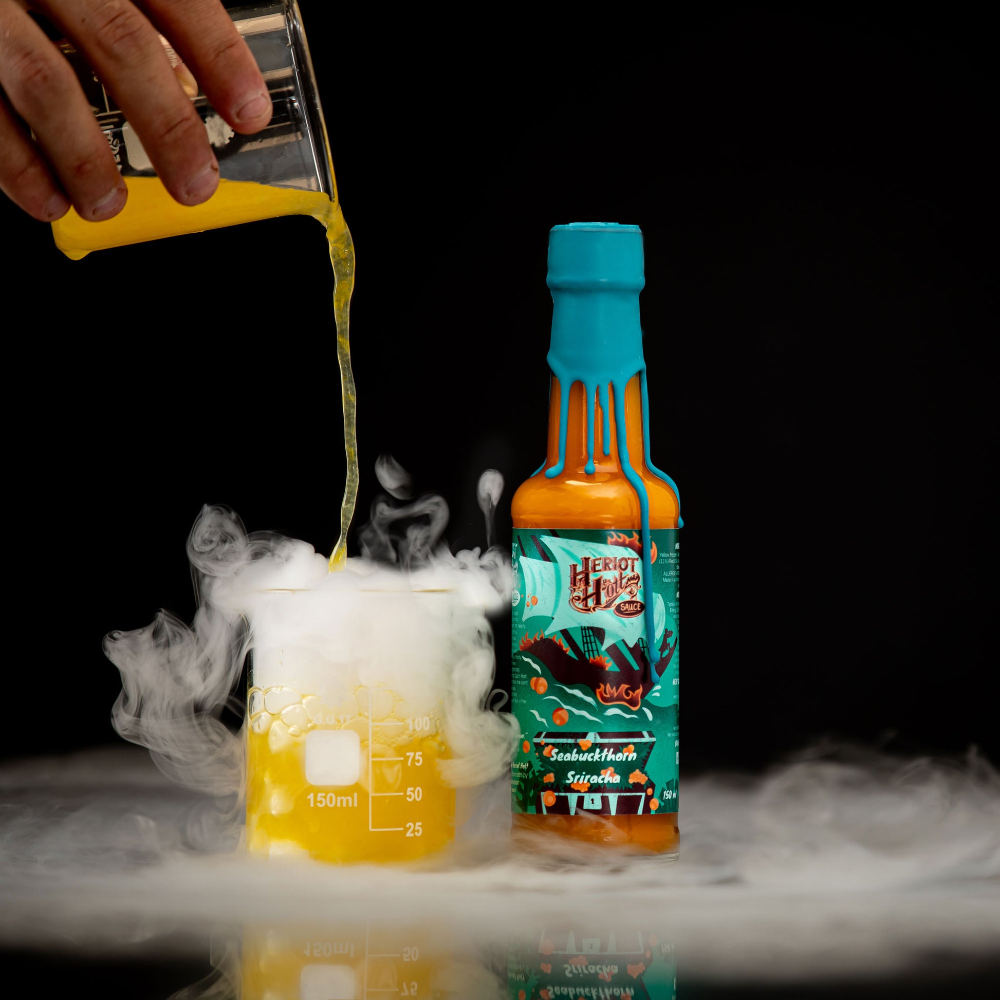 Seabuckthorn Sriracha Hott Sauce Science Lab Photo with Dry Ice for Experimental Photo - Heriot Hott